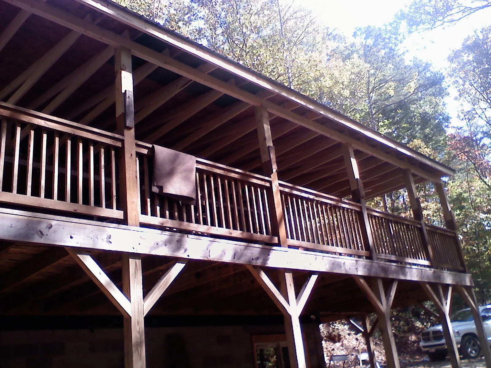 Timber framing under a new elevated porch and deck — Roof Leak Repair in Camp Sherman by Roofing Brothers